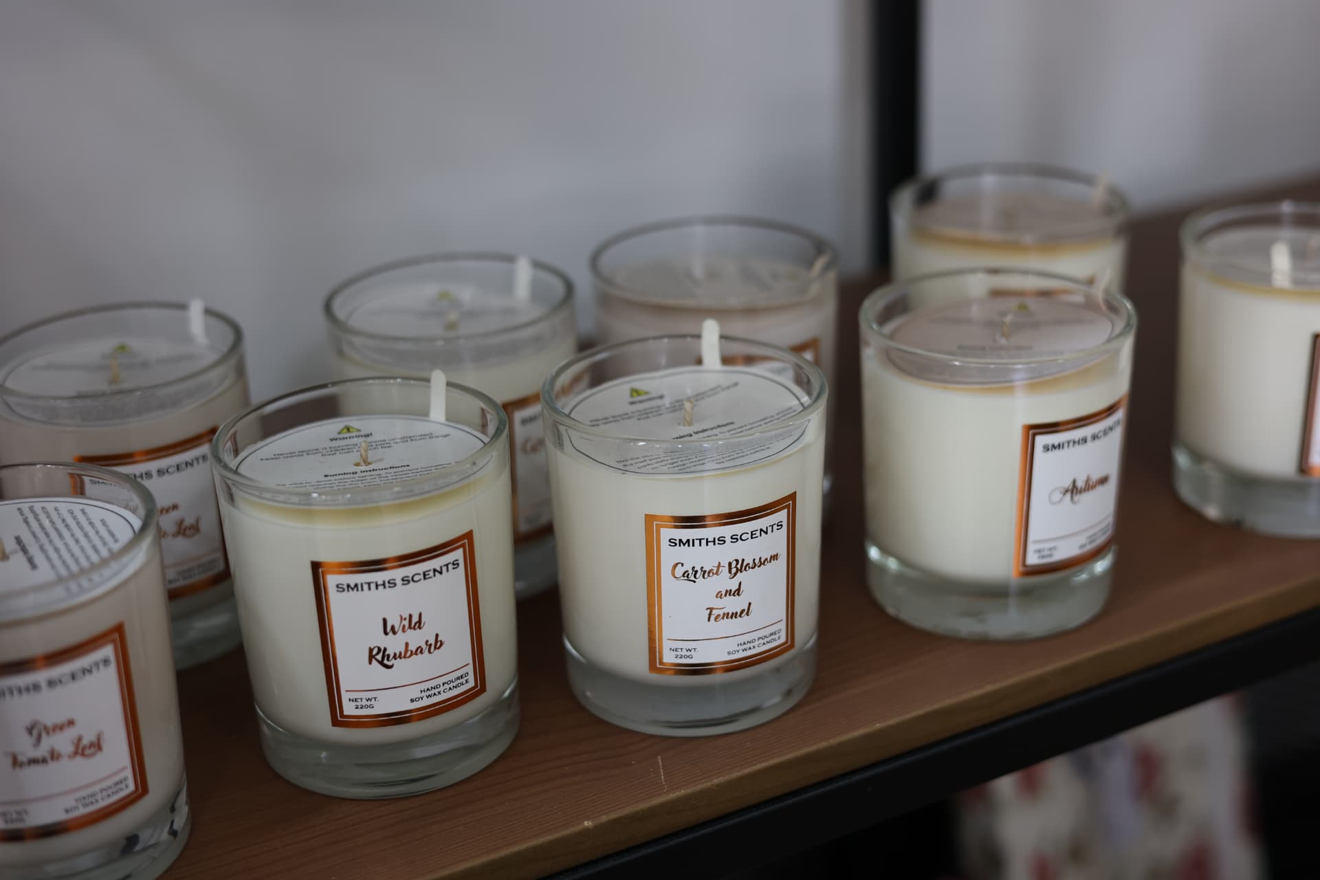 Shop and retail product photography Somerset showing hand poured soy wax candles on a shelf